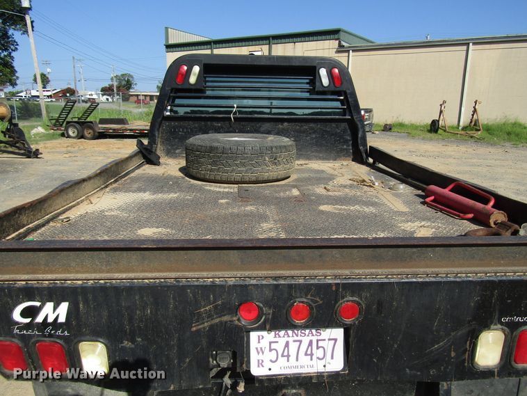image for item DG1345 2001 Ford F350 Super Duty Crew Cab flatbed pickup truck