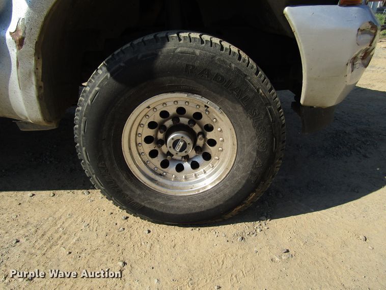 image for item DG1345 2001 Ford F350 Super Duty Crew Cab flatbed pickup truck