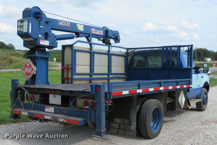 image for item DH1544 2004 Ford F550 Super Duty XL flatbed truck with crane