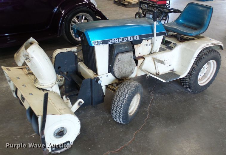 image for item DI0638 John Deere 112 lawn mower