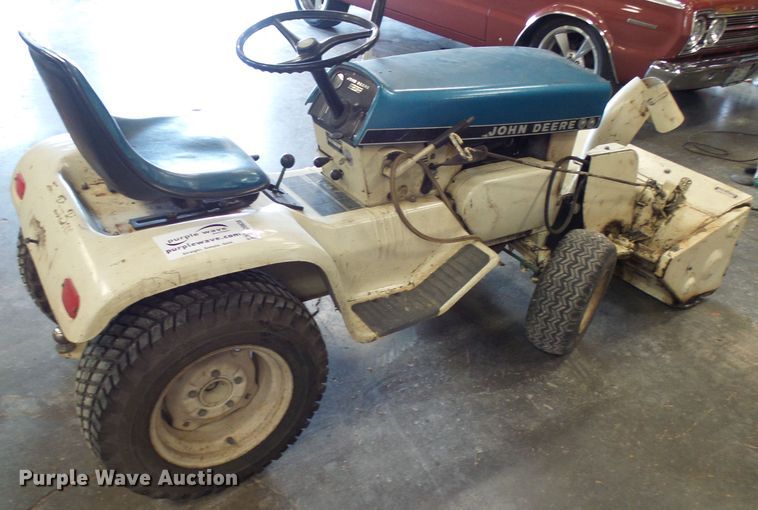 image for item DI0638 John Deere 112 lawn mower