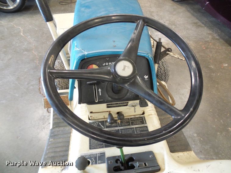 image for item DI0638 John Deere 112 lawn mower