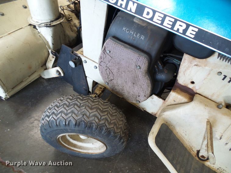 image for item DI0638 John Deere 112 lawn mower