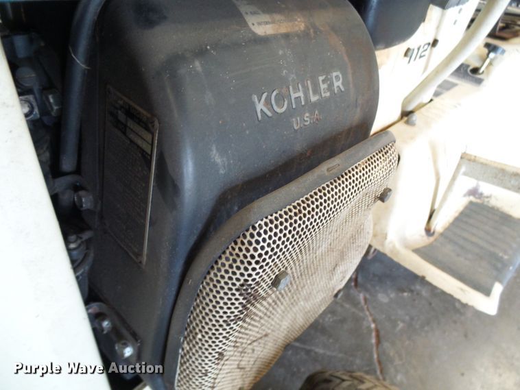 image for item DI0638 John Deere 112 lawn mower