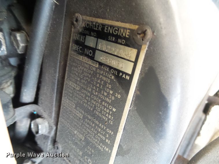 image for item DI0638 John Deere 112 lawn mower