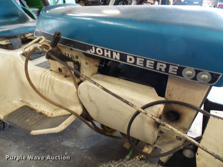 image for item DI0638 John Deere 112 lawn mower