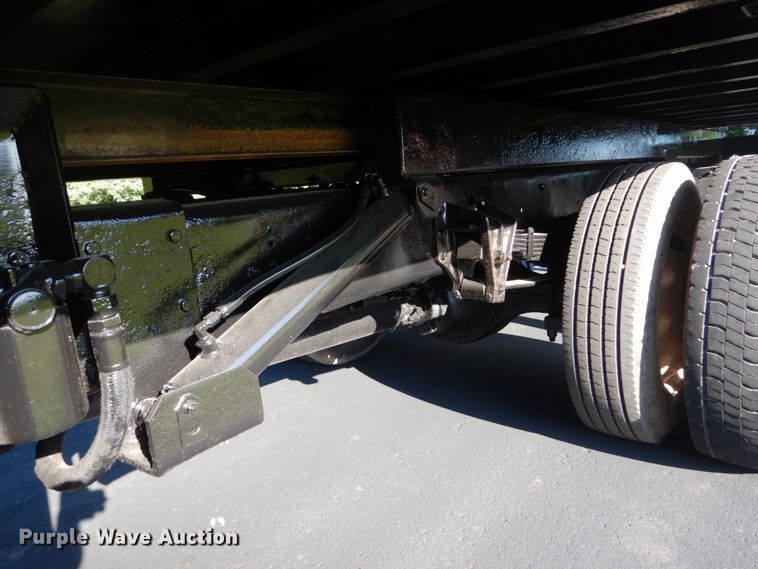 image for item FU9415 1999 International 4700 rollback truck