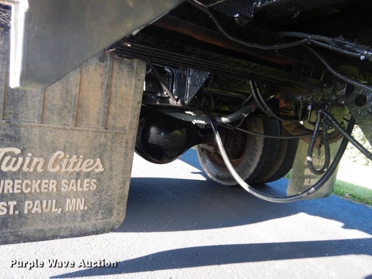 image for item FU9415 1999 International 4700 rollback truck