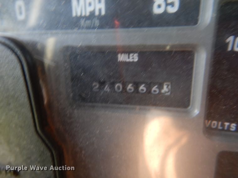 image for item FU9415 1999 International 4700 rollback truck