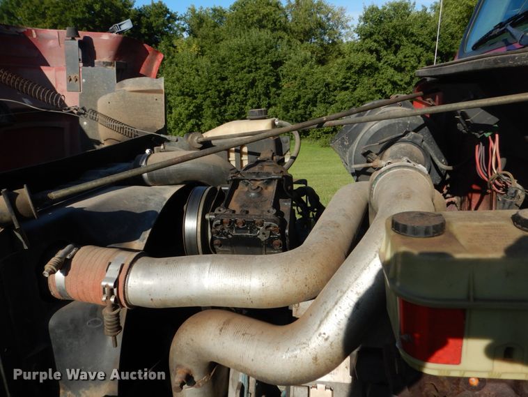 image for item FU9415 1999 International 4700 rollback truck