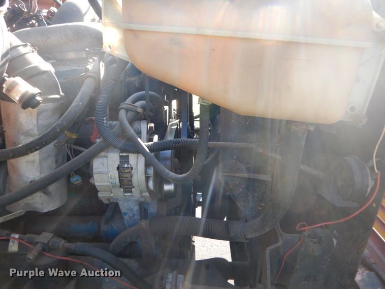 image for item FU9415 1999 International 4700 rollback truck