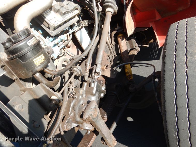 image for item FU9415 1999 International 4700 rollback truck