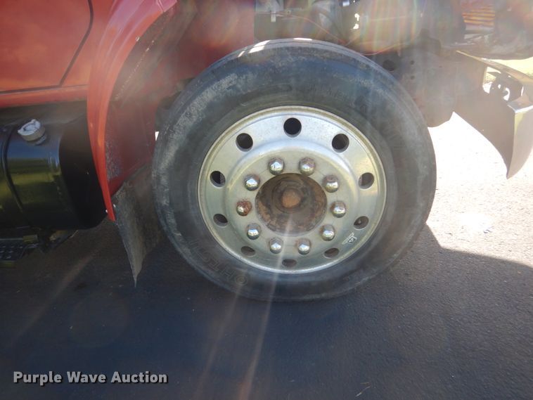 image for item FU9415 1999 International 4700 rollback truck