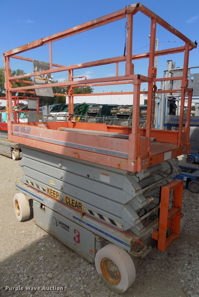 image for item DG2417 1999 Sky Jack SJIII 4832 scissor lift
