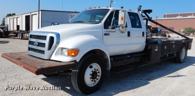 image for item DH3567 2012 Ford F750 Super Duty flatbed winch truck