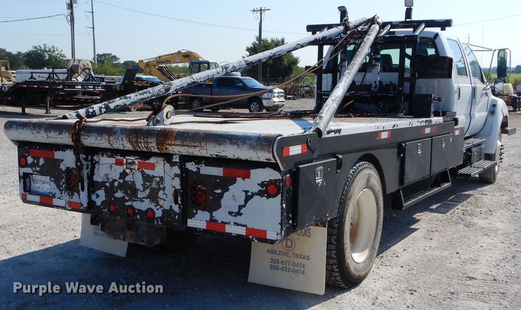 image for item DH3567 2012 Ford F750 Super Duty flatbed winch truck