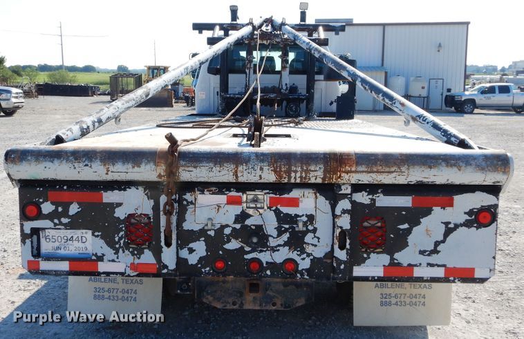 image for item DH3567 2012 Ford F750 Super Duty flatbed winch truck