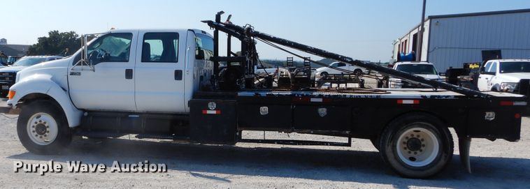 image for item DH3567 2012 Ford F750 Super Duty flatbed winch truck