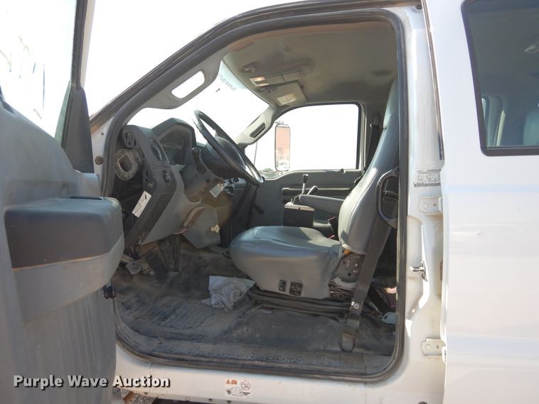 image for item DH3567 2012 Ford F750 Super Duty flatbed winch truck