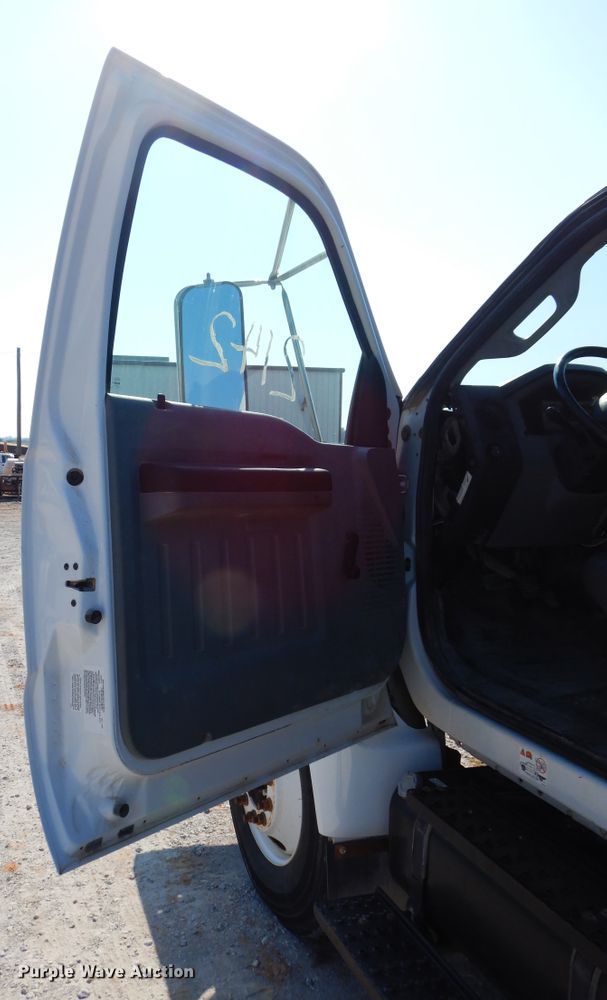 image for item DH3567 2012 Ford F750 Super Duty flatbed winch truck