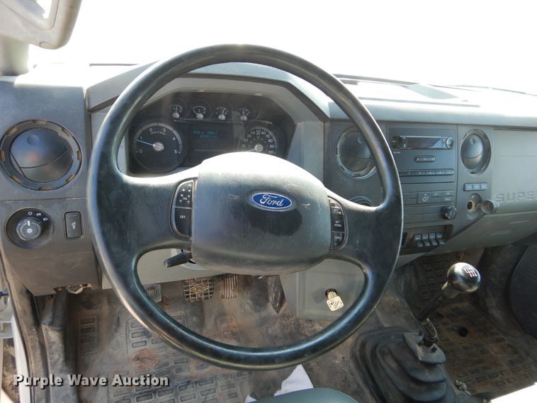 image for item DH3567 2012 Ford F750 Super Duty flatbed winch truck