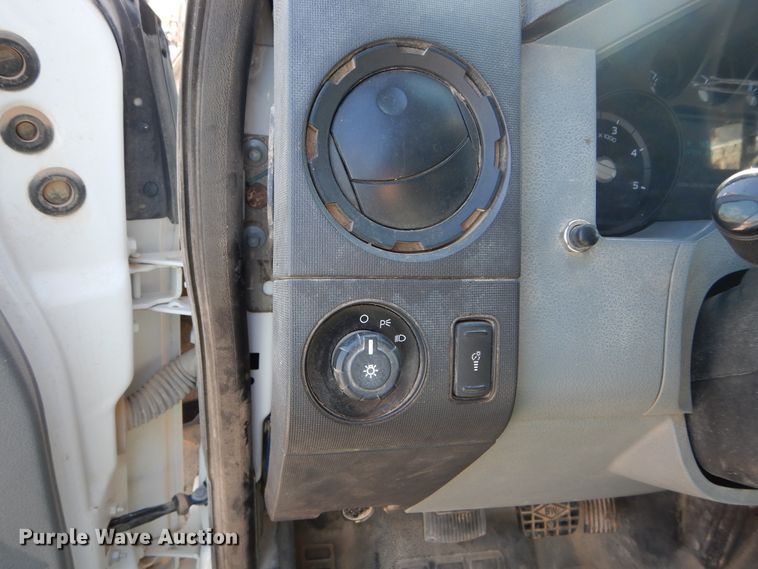 image for item DH3567 2012 Ford F750 Super Duty flatbed winch truck