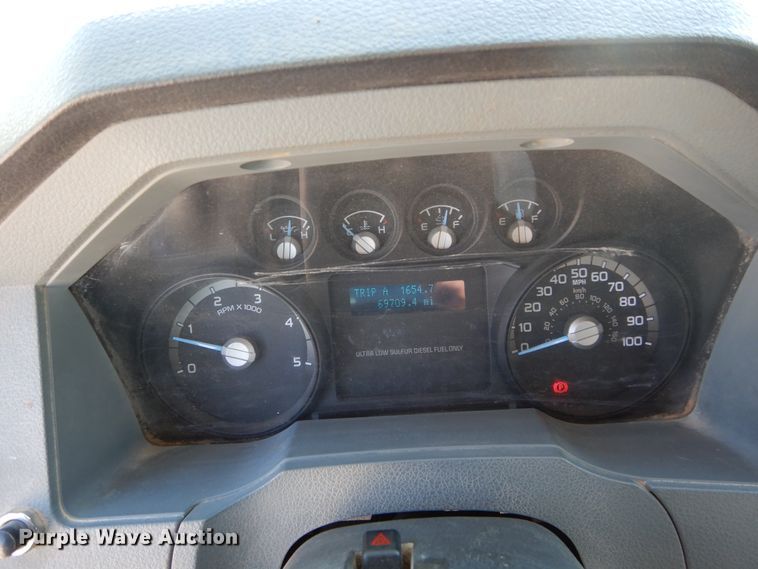 image for item DH3567 2012 Ford F750 Super Duty flatbed winch truck