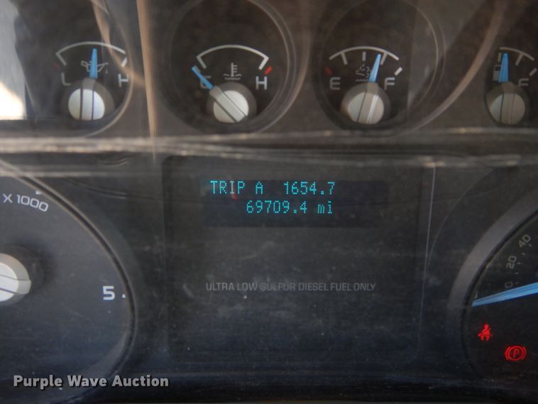 image for item DH3567 2012 Ford F750 Super Duty flatbed winch truck