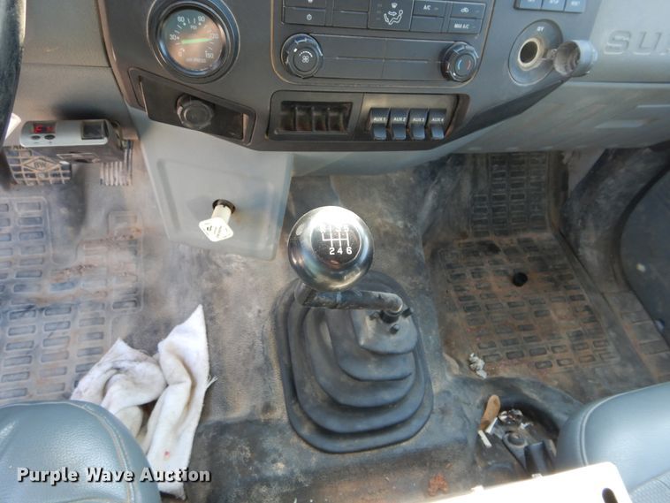 image for item DH3567 2012 Ford F750 Super Duty flatbed winch truck