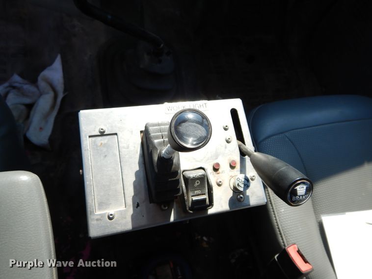 image for item DH3567 2012 Ford F750 Super Duty flatbed winch truck