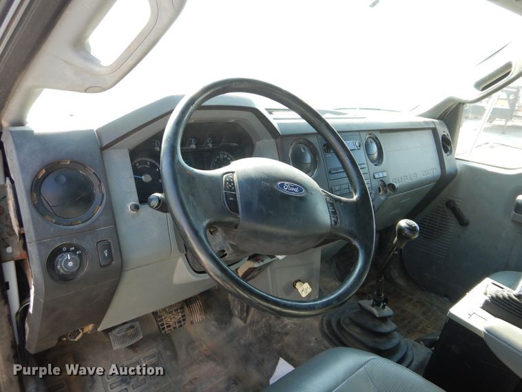 image for item DH3567 2012 Ford F750 Super Duty flatbed winch truck