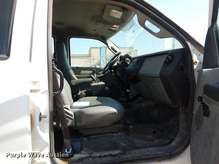 image for item DH3567 2012 Ford F750 Super Duty flatbed winch truck