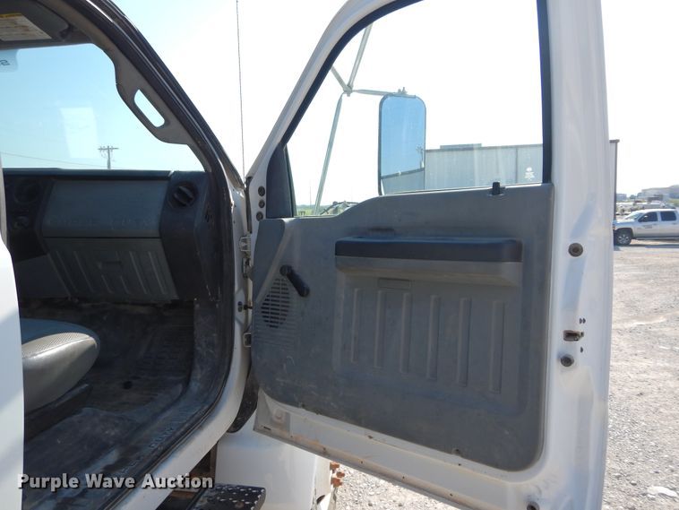 image for item DH3567 2012 Ford F750 Super Duty flatbed winch truck