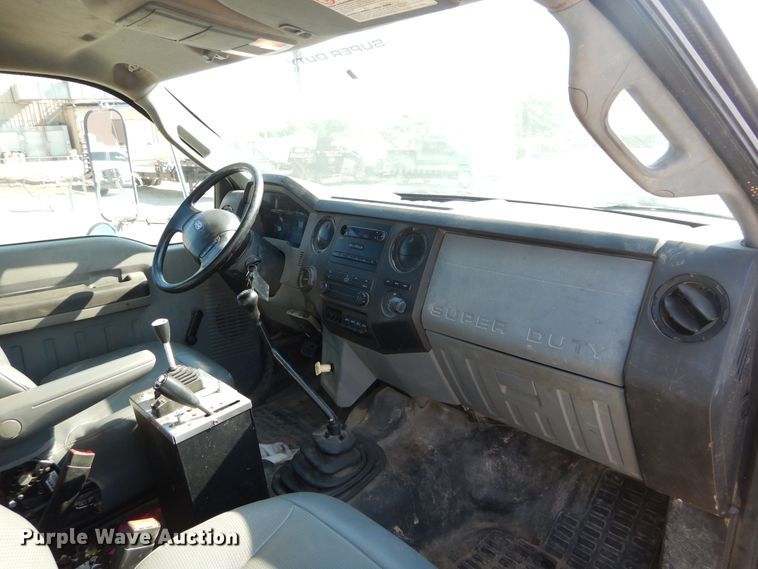 image for item DH3567 2012 Ford F750 Super Duty flatbed winch truck