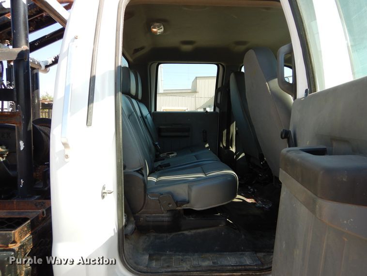 image for item DH3567 2012 Ford F750 Super Duty flatbed winch truck