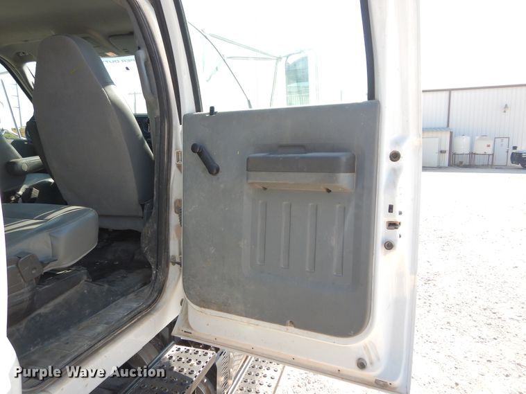 image for item DH3567 2012 Ford F750 Super Duty flatbed winch truck