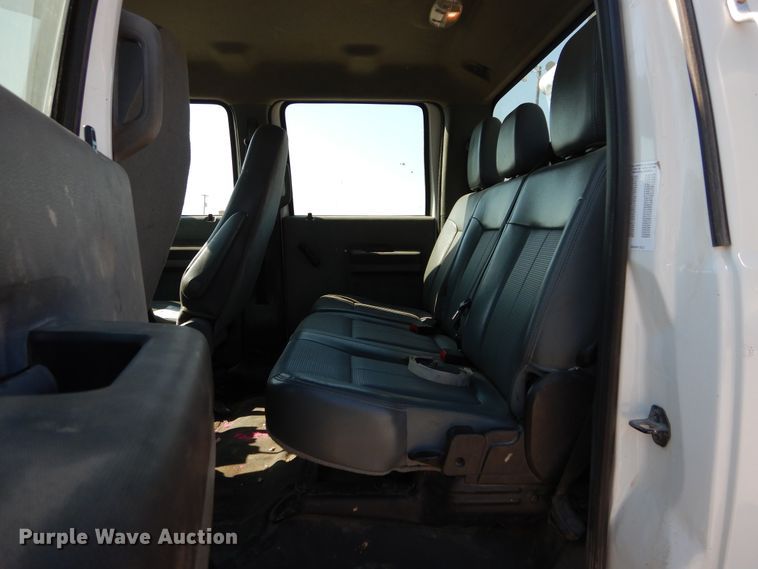 image for item DH3567 2012 Ford F750 Super Duty flatbed winch truck