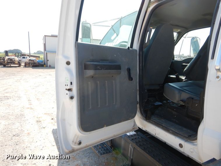 image for item DH3567 2012 Ford F750 Super Duty flatbed winch truck