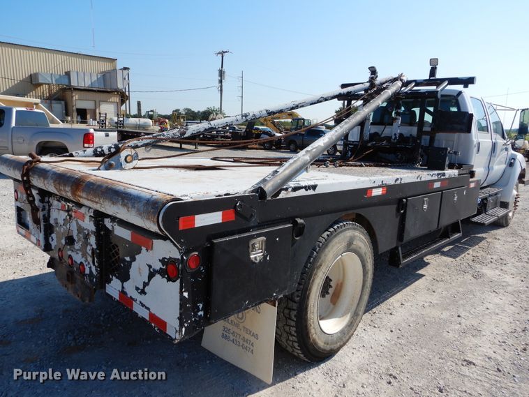 image for item DH3567 2012 Ford F750 Super Duty flatbed winch truck