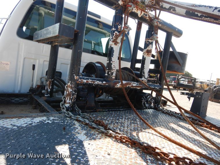 image for item DH3567 2012 Ford F750 Super Duty flatbed winch truck