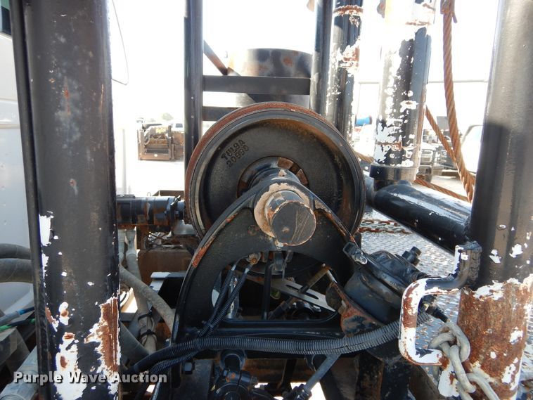 image for item DH3567 2012 Ford F750 Super Duty flatbed winch truck