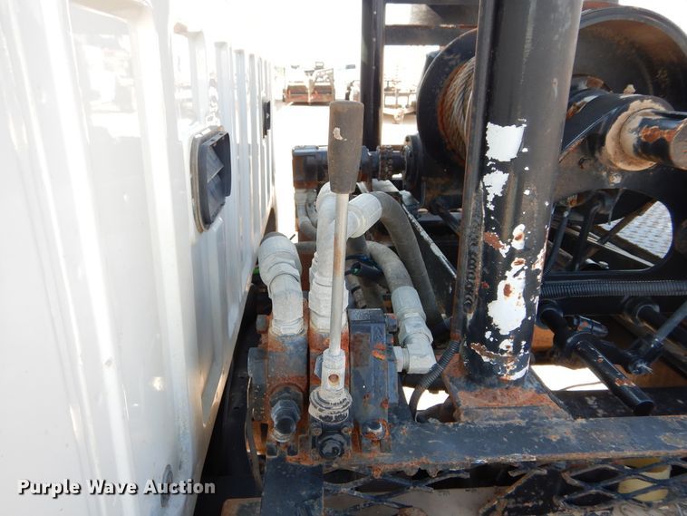 image for item DH3567 2012 Ford F750 Super Duty flatbed winch truck