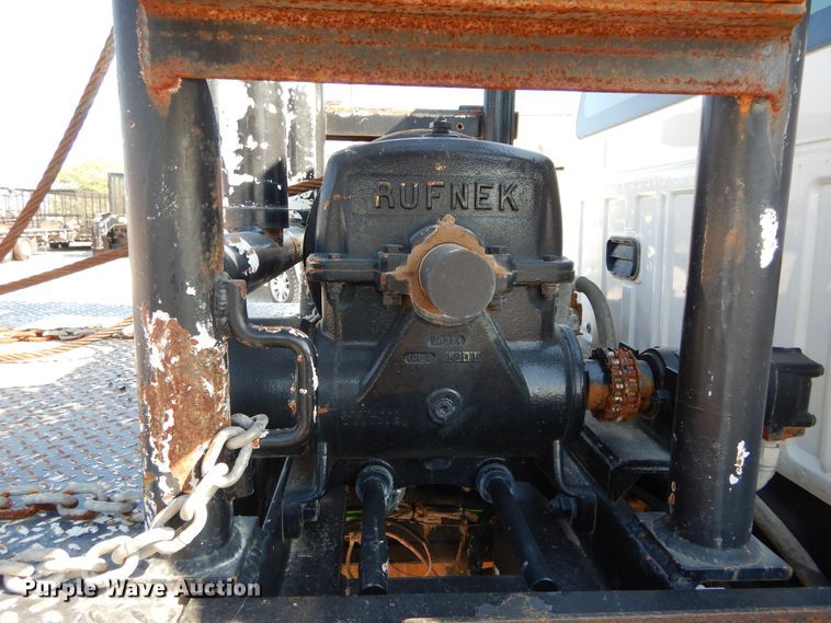 image for item DH3567 2012 Ford F750 Super Duty flatbed winch truck