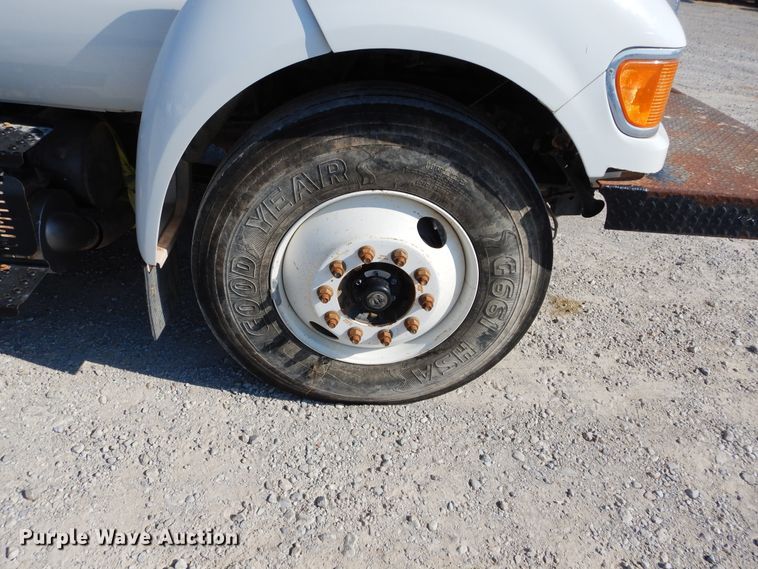 image for item DH3567 2012 Ford F750 Super Duty flatbed winch truck