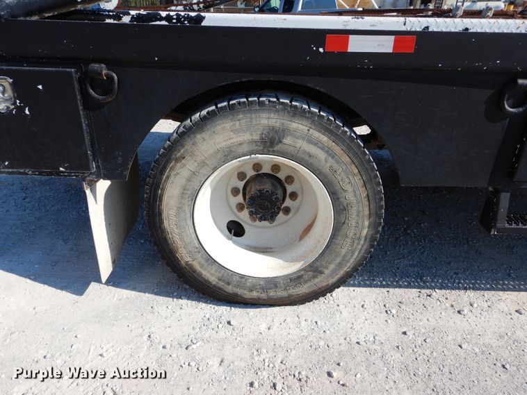 image for item DH3567 2012 Ford F750 Super Duty flatbed winch truck