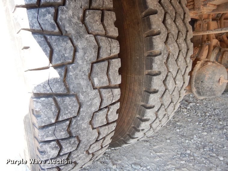 image for item DH3567 2012 Ford F750 Super Duty flatbed winch truck