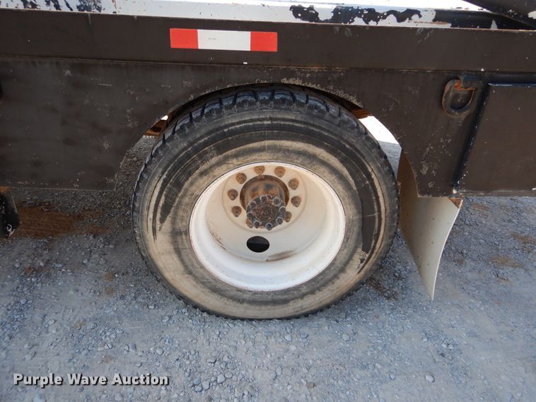 image for item DH3567 2012 Ford F750 Super Duty flatbed winch truck