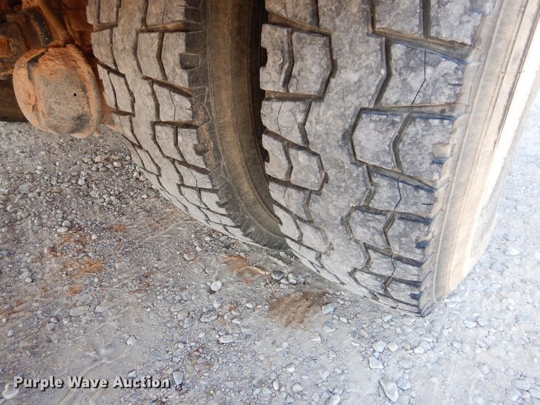 image for item DH3567 2012 Ford F750 Super Duty flatbed winch truck