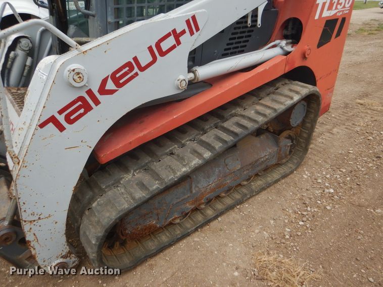 image for item FG9779 2004 Takeuchi TL150 skid steer