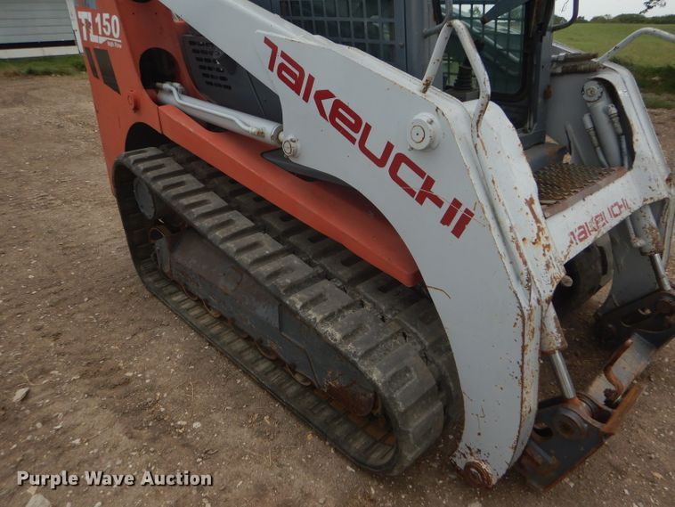 image for item FG9779 2004 Takeuchi TL150 skid steer